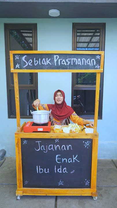 Little boy buys seblak buffet snacks