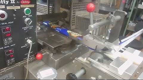 BID ON EQUIPMENT: Item 334010 - DOBOY Scotty II Horizontal Flow Wrapper