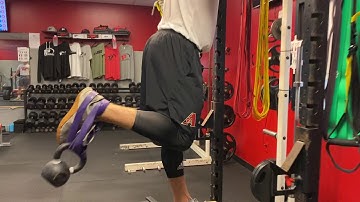 Standing Single Leg Hamstring Curls (Banded + Kettlebell)