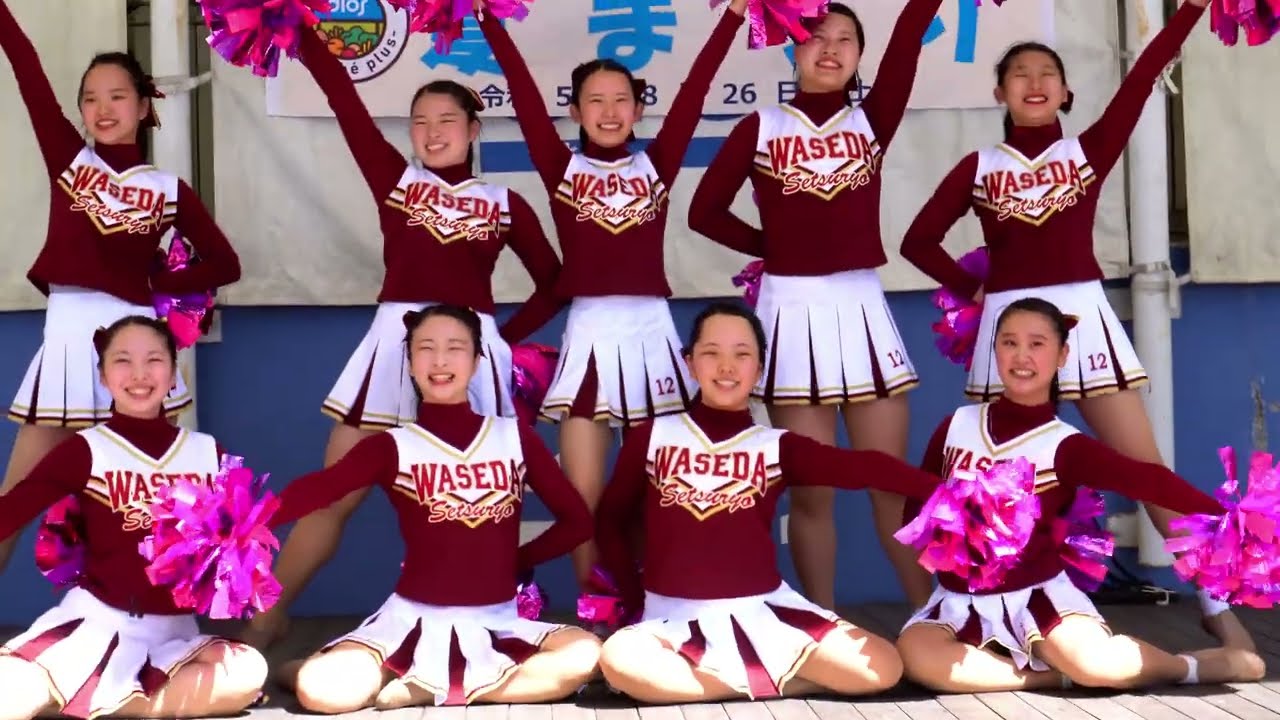 Cheerleading] The cheerleading team appears with a smile