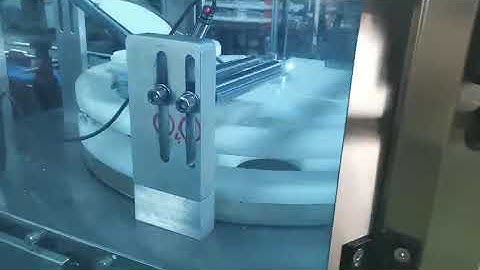 biscuit weighing filling , hot foil sealing , capping machine,cookies productionn line