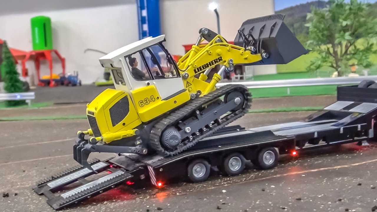 RC tractors work hard on a HUGE display! YouTube