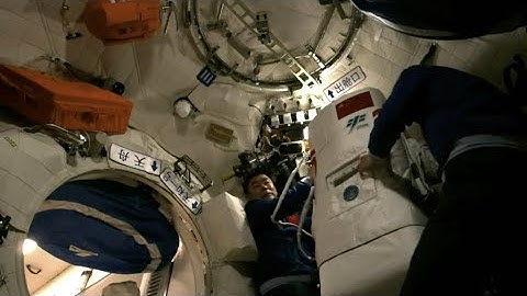 Taikonauts prepare extravehicular spacesuits for major tasks in orbit