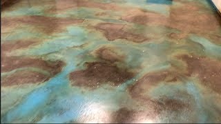 Ebony And Turquoise Acid Stained Basement Floor