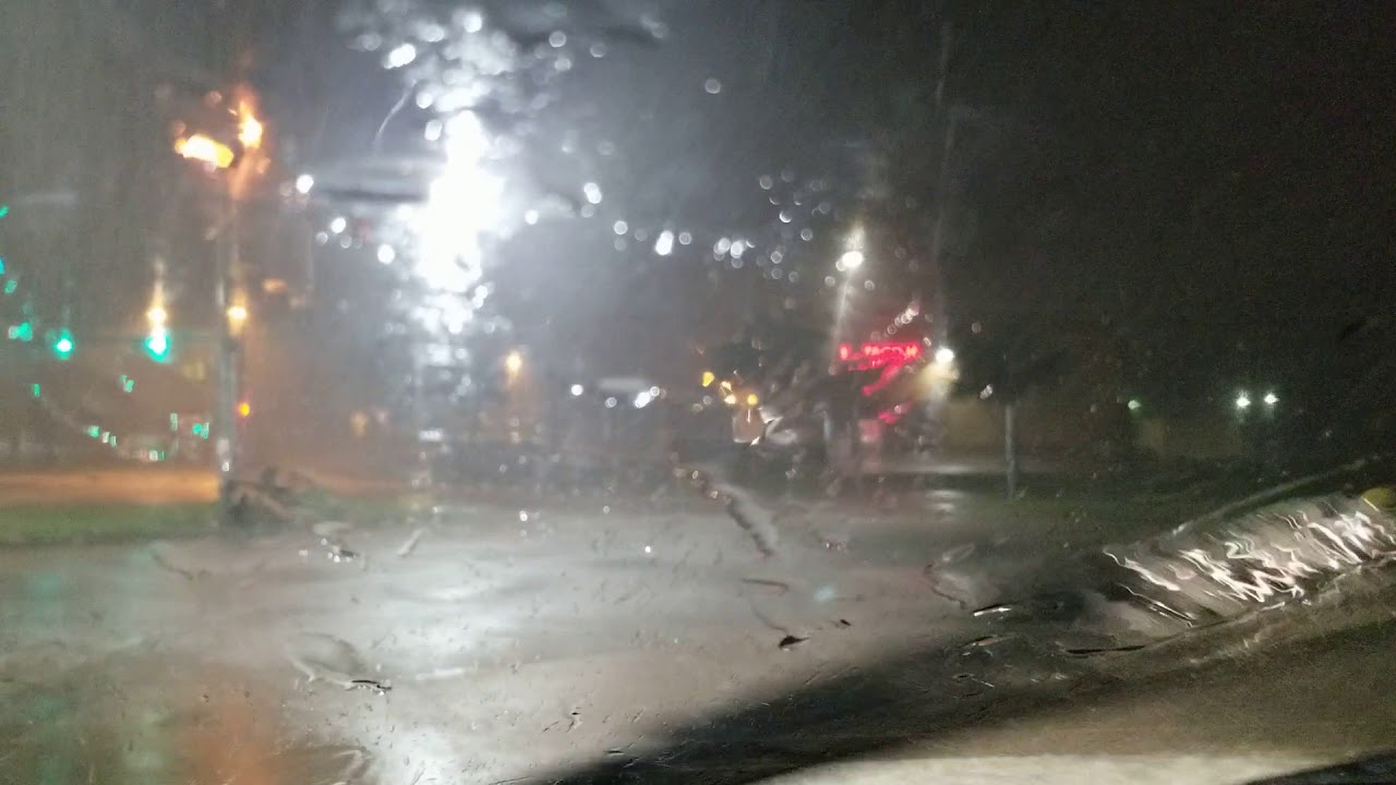 Rainstorm inside car at gas station. - YouTube