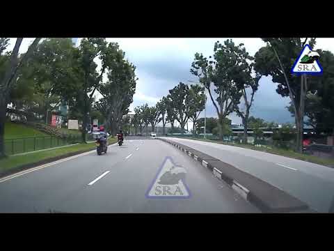 E-biker on road, without helmet and did not conform to red light
