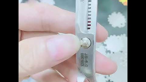 Dụng cụ chỉnh kéo cắt tóc