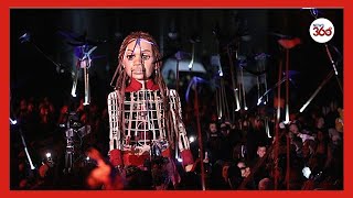 UK: Crowds greet giant puppet of refugee girl Little Amal in finale of 8,000km walk to Manchester
