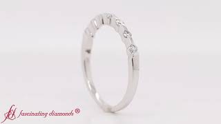 Thin Spaced Out Seven Diamonds Wedding Band In 14K White Gold