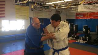 Arm bar into wrist lock - Small Circle JiuJitsu | Warriors Magazine