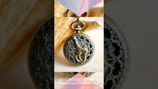 Giraffe battery operated pocket watch in bronze.