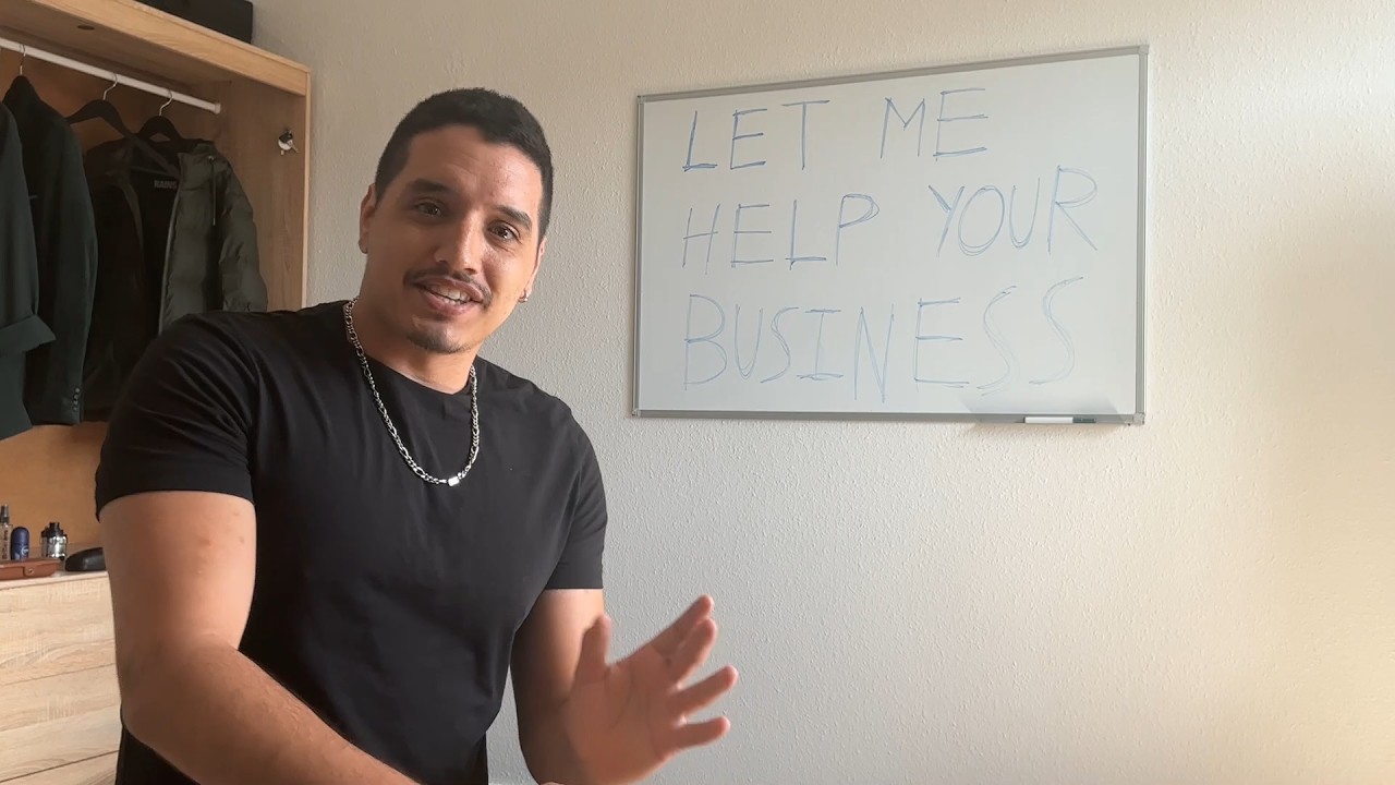 Vektor.Space founder in front of a whiteboard reading Let me help your business