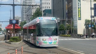 岡山電気軌道9200形MOMO2 1011編成　ハレノワラッピング　岡山駅前東山線乗車ホーム入線