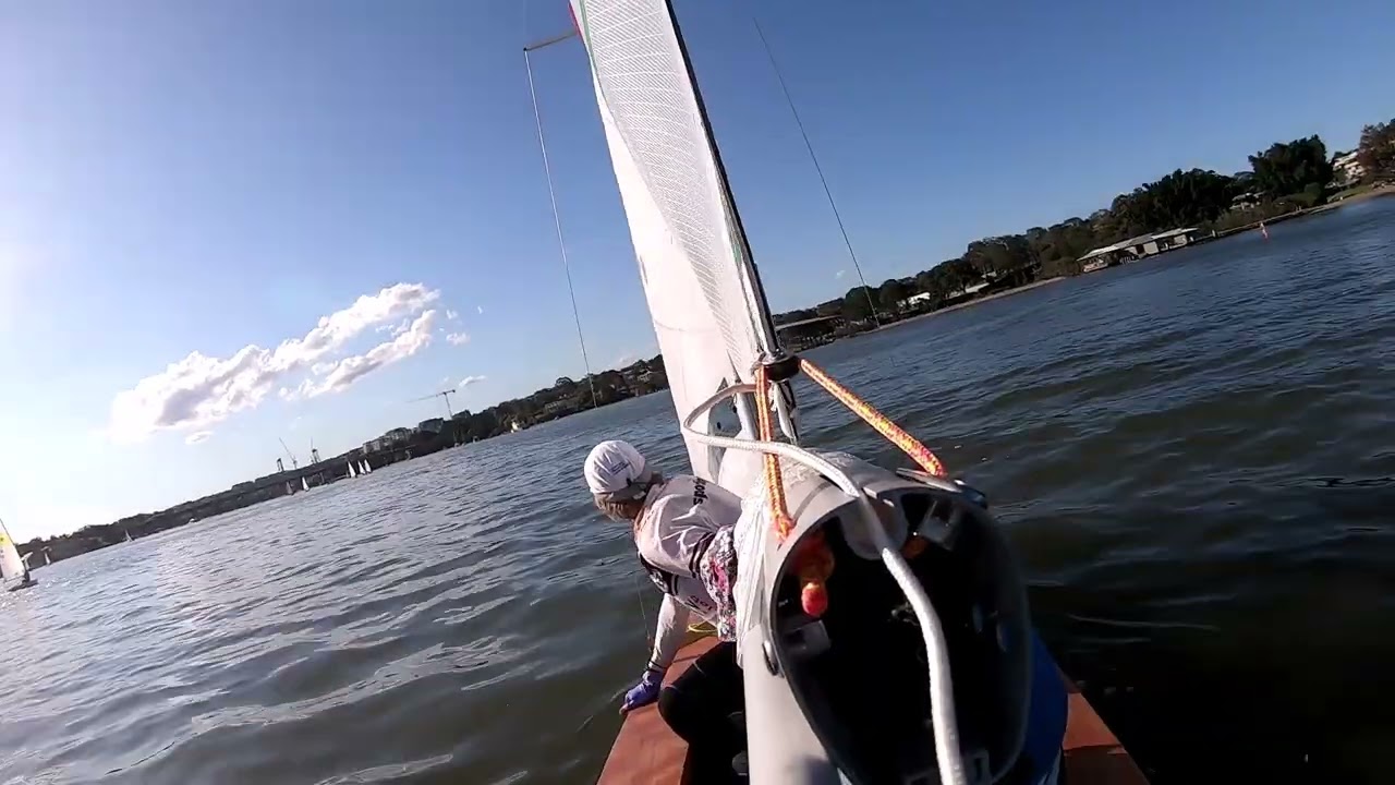 250913 #6 Greg and Francesca sailing the Rainbow 'Lorikeet' at CRSC. Francesca skippers to the line