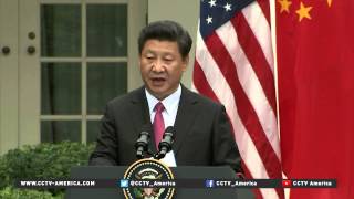 Xi and Obama discuss climate change, cybertheft and the South China Sea