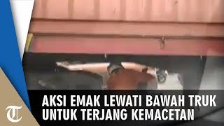Demi Terjang Kemacetan, Seorang Emak-emak Nekat Lewati Kolong Truk Kontainer
