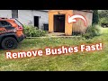 The easiest way to remove a bush. How to pull a shrub with a tow strap.