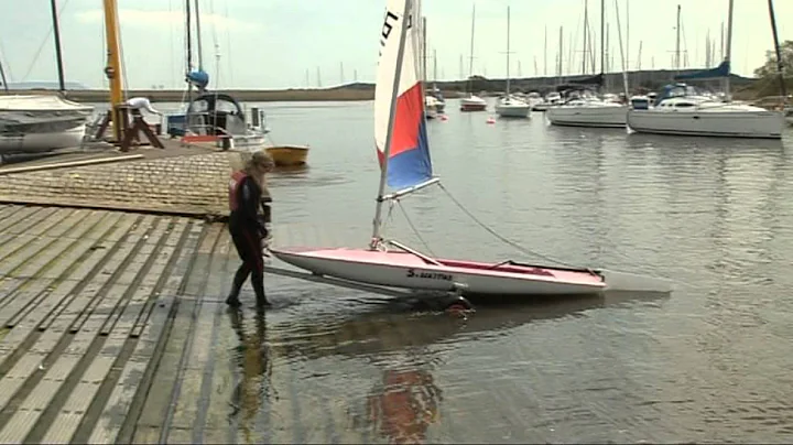 Dorset's Stacey Herring carries the Olympic flame.