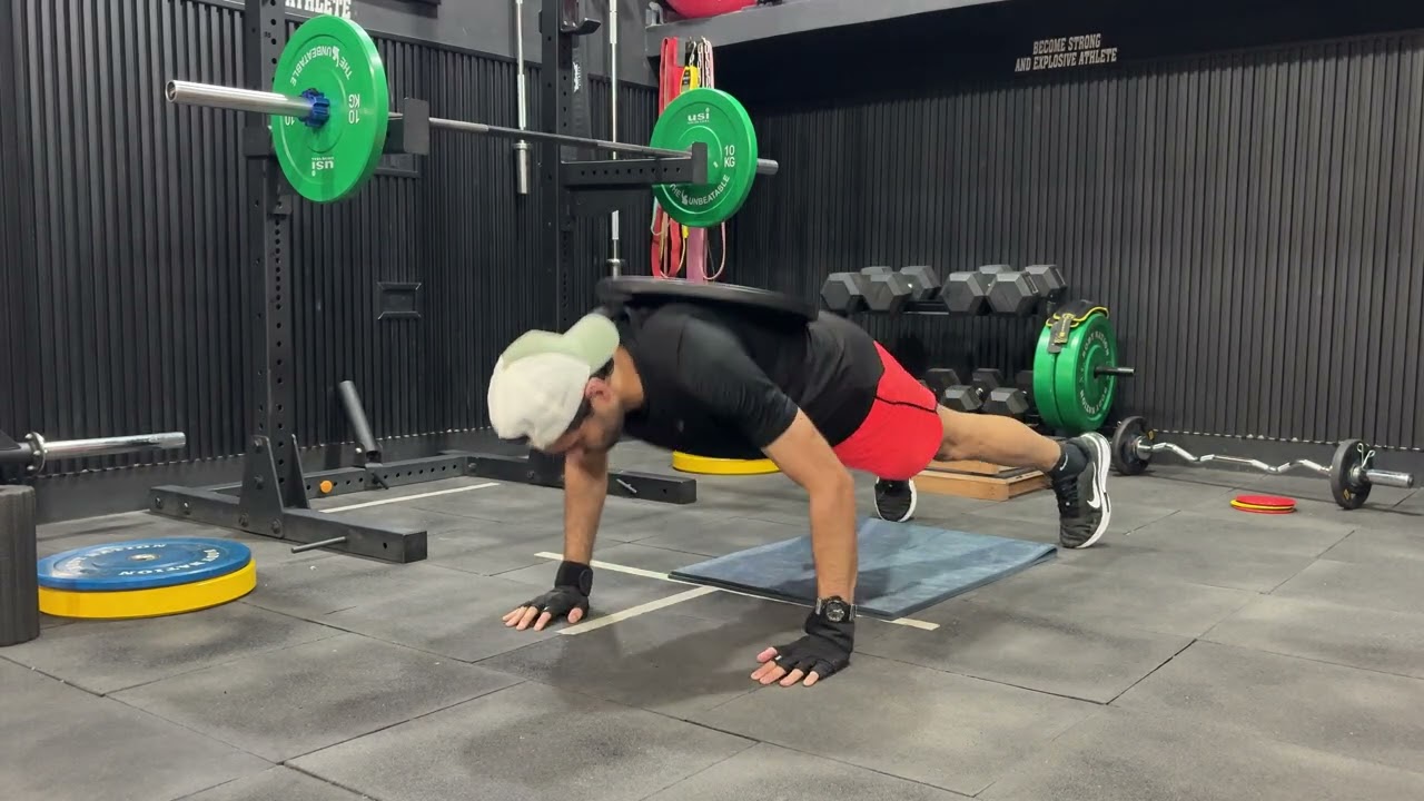 Loaded push ups (plate) 