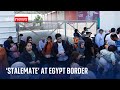 Israel-Gaza war: &#39;Stalemate&#39; at Egypt border as people flee Gaza