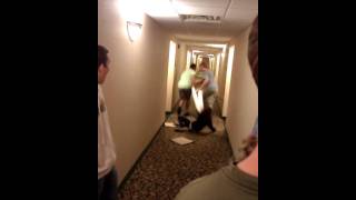 Sliding on pizza boxes in a hotel hallway 1