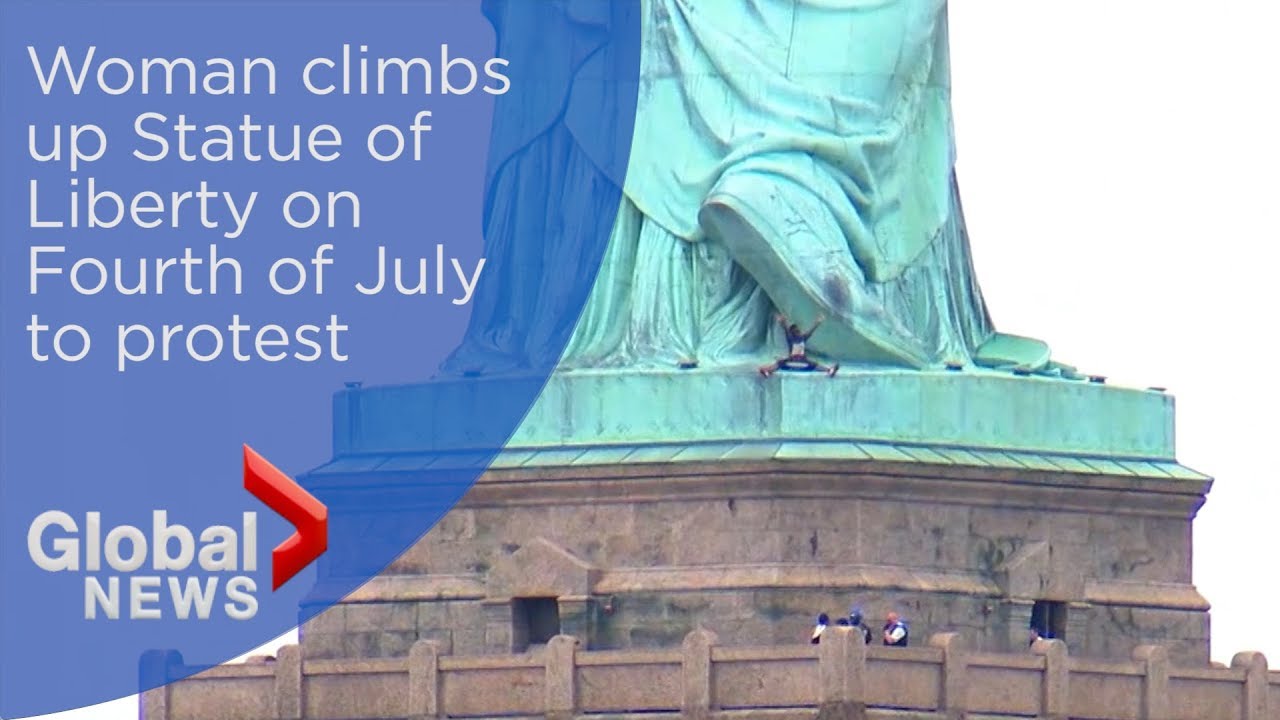 Woman climbs up Statue of Liberty on Fourth of July to protest U.S ...