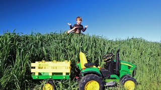 We lost our Power Wheels tractor in the grass | Tractors for kids on the farm adventure