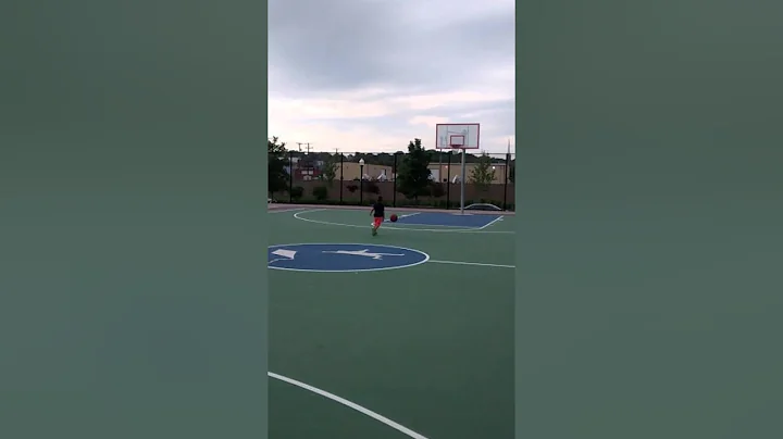 4 year old shooting hoops
