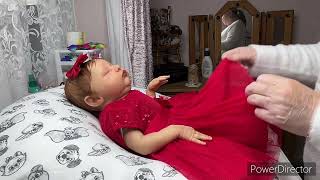 Changing The Lovely Lilith Into Her Christmas Day Outfit