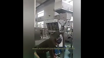 Semi-automatic packing system with linear weigher