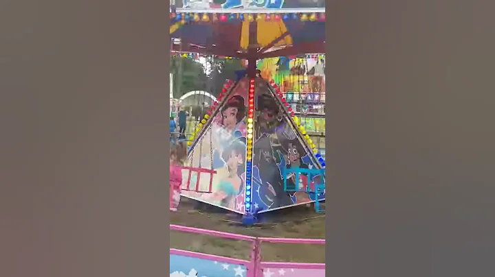 Georgiana on the swings.