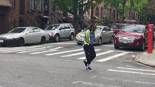 Brooklyn's Dancing Crossing Guard Grooves Rain or Shine