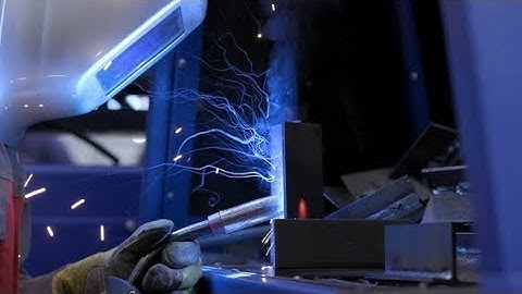 Welder and Welding Sparks at Metal Production Factory | Stock Footage - Videohive
