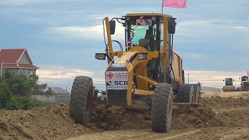Motor Grader Grading The Edge And The Road-Skilled Operator