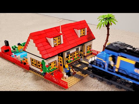 Lego train crash into a town house villa