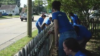Volunteers help elderly woman clean up and fix up her Hampton home