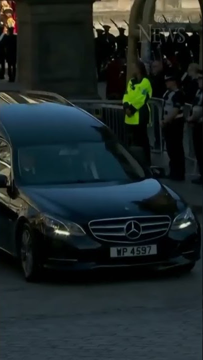 Crowd claps as Queen's coffin departs St. Giles' Cathedral