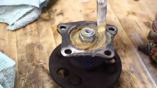 How to add grease to wheel bearings rear Toyota Corolla. Years 1991 to 2002.
