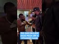 Pro bodybuilder kicks pizza off a stranger hand