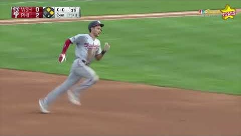 Nationals shortstop Trea Turner hits it to deep center field for a two-run, inside-the-park home run