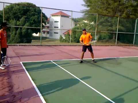 Coach Ashaari giving tennis lessons - Forehand Str...