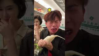 A young guy uses a giant spicy Latio and candy to impress a girl next to him