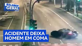Unlicensed and intoxicated driver causes Porsche crash, leaving man in a coma in São Paulo.
