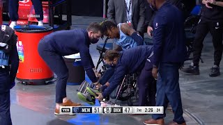 Ja Morant was taken off the court in a wheel chair after badly spraining his ankle