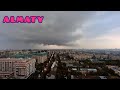 Туча атакует Алматы начинается дождь. Капли на окне. Вид на город. Ускорение 12х - 1 Minute Story NS