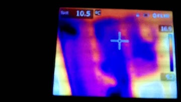 Pete uses thermal imaging to show where insulation is missing in a roof
