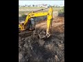 A powerful and large excavator is brought into the water.