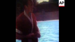 SYND 12 8 74 US PRESIDENT, GERALD FORD, SWIMS IN HIS POOL
