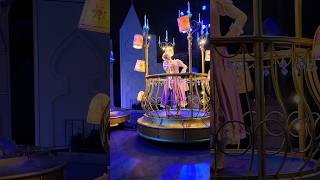 Rapunzel from Tangled in the Paint the Night electrical parade at Disneyland in 2026