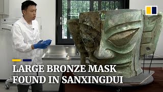Restoration work underway on largestever bronze mask unearthed in China’s Sanxingdui ruins